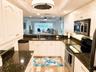 Kitchen with Bar, under cabinet lighting.