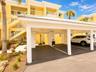 Carport area covered to condo. Guest Parking!