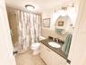 Promary Bath with tub and shower.