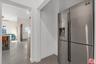 Hallway adjacent to kitchen