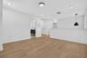 Loft area leads to hallway and access to 3rd bathroom.
