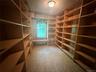 The former owner used this as a library.  It could easily be a pantry, collectable room or seasonal storage