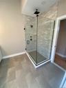 The walk-in shower offers a clean, modern, design for a comfortable daily routine.