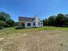A spacious yard creates an inviting setting for outdoor entertaining and everyday enjoyment.