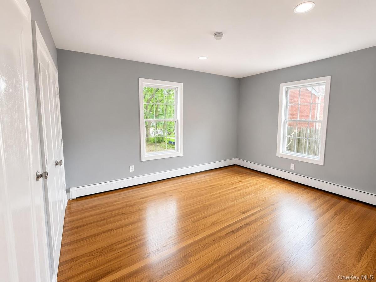 1 of the 5 bedrooms. Current.