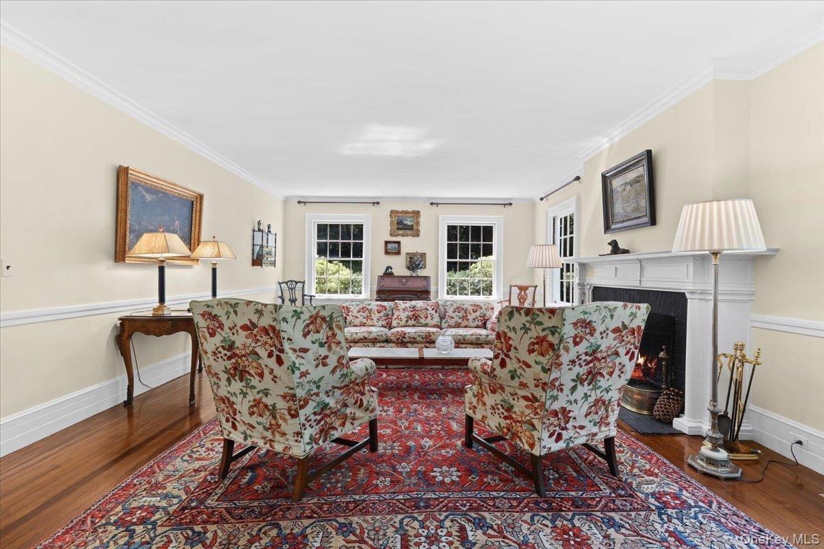 Lovely living room with fireplace and high ceilings