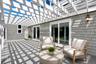 Patio overlooking the pool (Virtually Staged)