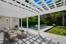 Patio overlooking the pool (Virtually Staged)