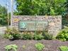 Professionally landscaped entrance monument.