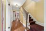 Front hall with classic staircase