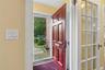 Gracious and welcoming foyer with guest closet