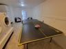 Ping Pong table/washer, dryer, extra fridge.  Access to pool area