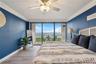Stunning view from primary bedroom with private balcony.