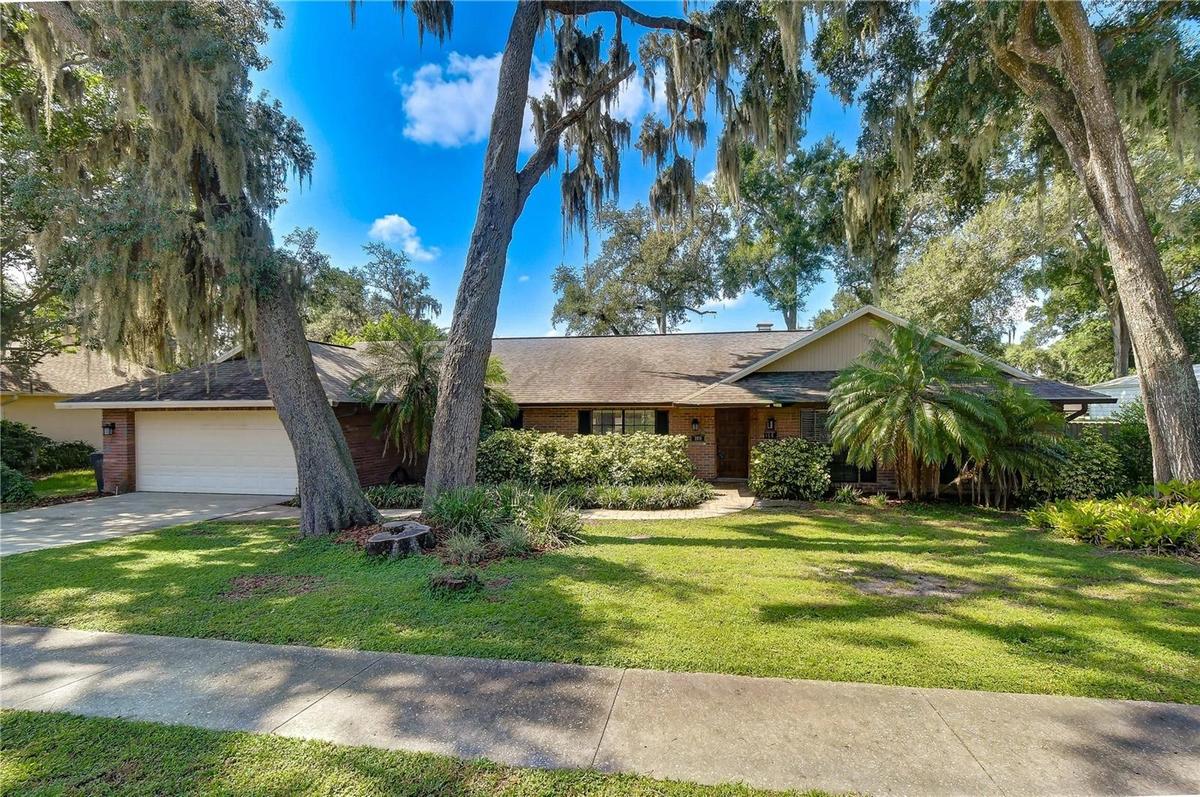 Charming pool home tucked away on a quiet, tree-lined cul-de-sac