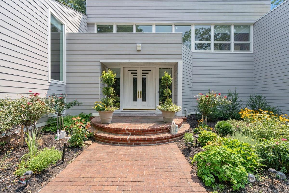 private driveway leads to front