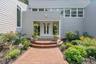 private driveway leads to front