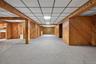 about 1000 sq ft extra space with storage, dedicated rooms and utilities