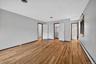 Hardwood flooring, light gray wall finishes, built-in closet , en-suite