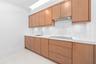 Fully Equipped Butler’s Kitchen with Dishwasher and Cooktop