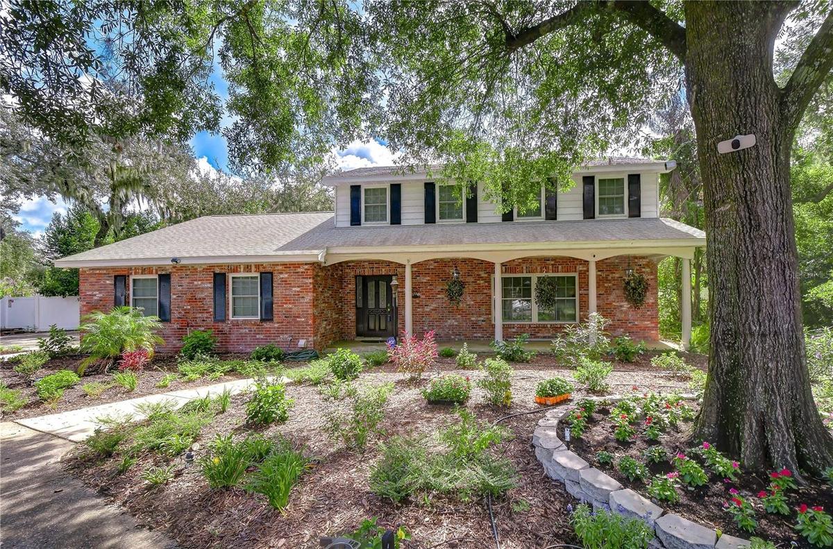 Beautifully updated Brandon home situated on more than half an acre of lush, private grounds
