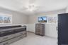 Recessed lighting, wall-to-wall carpeting, and a ceiling fan with light fixture