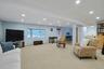 The family room leads directly to the patio, backyard and the lake.