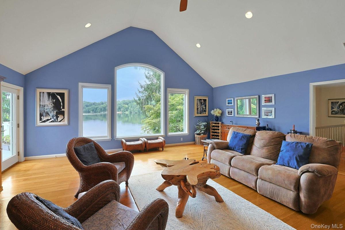 Beautiful lake views and a seamless connection to the outdoors through the French doors leading to the deck. Hear the water lapping against the shore,