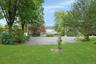 Generous parking for 6–10 vehicles, with additional buildable lot for a garage if desired