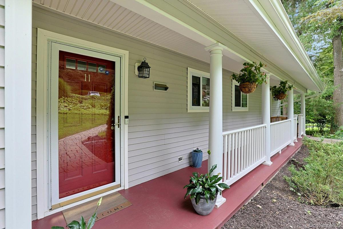Beautiful front porch, timeless charm, and the perfect entry to your happy place. Welcome home.