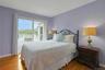 The second  bedroom opens directly onto the deck, where beautiful lake views create a peaceful retreat just steps from your room.