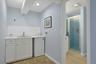 A full bathroom just off the family room adds comfort and convenience for everyday living.