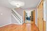 Gleaming hardwood floors greet you in the foyer and continue into dining room