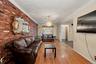 Living room with view to front entrance foyer.