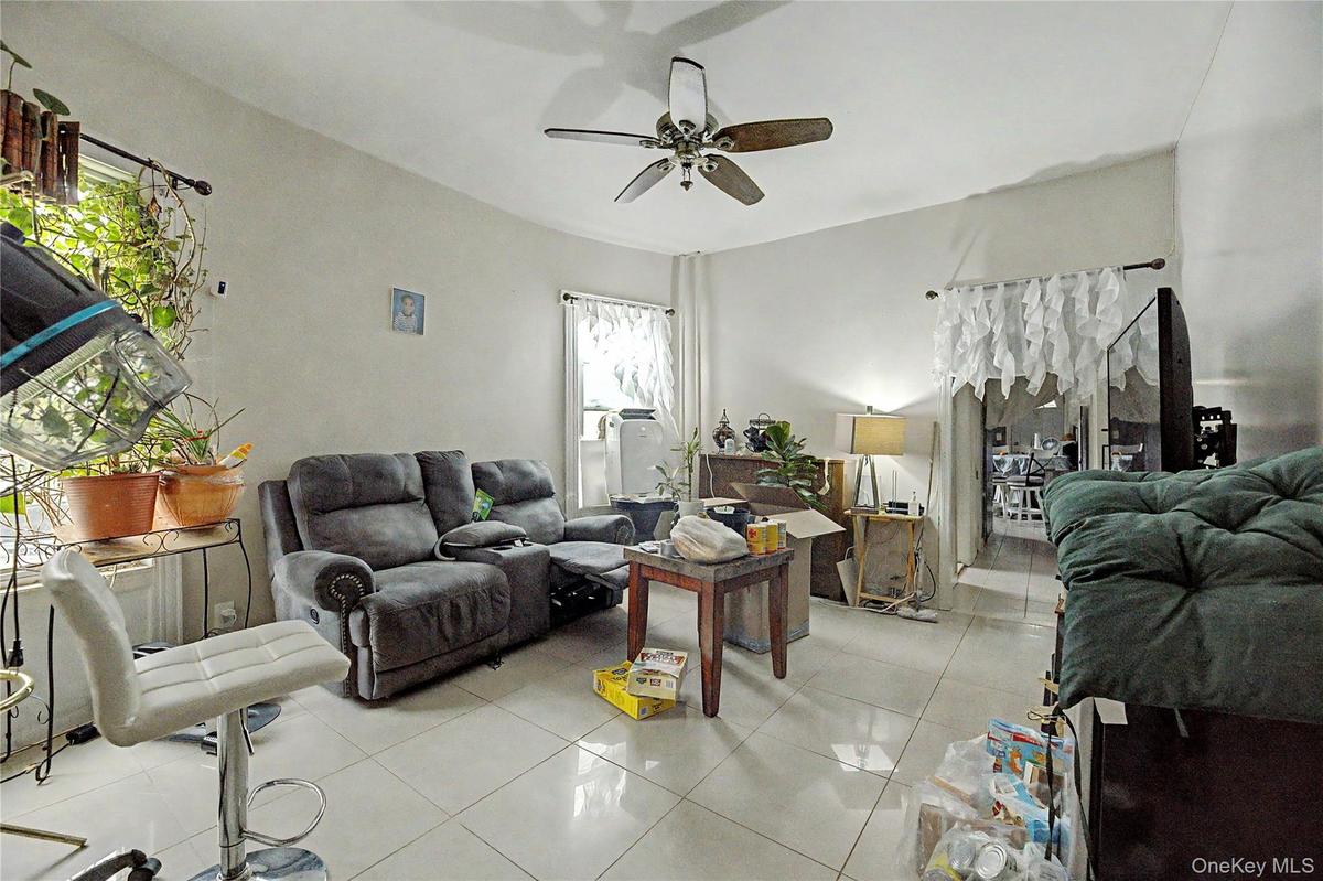 Spacious, light-filled living room.