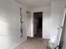 Hall featuring carpet floors and baseboards