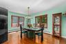 The elegant formal dining room provides a sophisticated setting for intimate dinners, festive gatherings, and memorable celebrations.