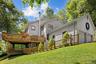 Three levels of expansive decking extend the living space outdoors, creating the perfect setting for summer gatherings, special celebrations, and year