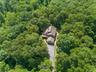 Custom-built contemporary home offering exceptional privacy, surrounded by lush greenery and tranquil landscaping that creates a peaceful, secluded ha
