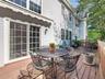 Spacious secluded deck designed for seamless entertaining.  Newer Andersen slider leads to formal dining room.  Newer remotely retractable awning.