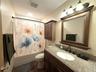 2nd floor full bath. Vanity with granite top.