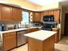 Island offers a granite top. Propane range.