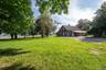 Large backyard in front of the barn.