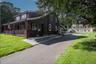 The amazing wide front porch was added with the second floor dormers by Edwin King in the 1920's.  He also purchased and moved the barn from the Orien