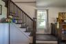 Beautiful front and rear staircases brings the charm and character of this historic Craftsman home together. The back stairs come from the bedrooms to