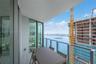Wraparound terrace with seating and sweeping Biscayne Bay views