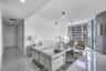 Bright living space opening to the dining area and terrace