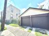 Side of house and garages
