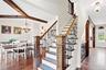 Open concept living with great flow from one living space to another. Rich hardwood floors and neutral walls.