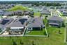 Aerial pond to home view