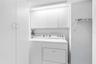 Inside Laundry with plenty of Storage